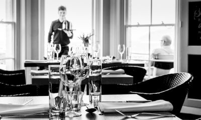 Waiter serving drinks
